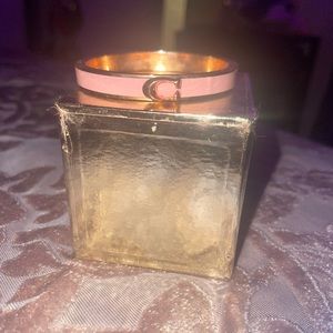 Pink and gold coach bracelet